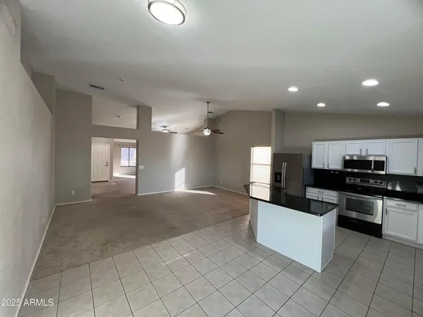 a view of a kitchen with a sink