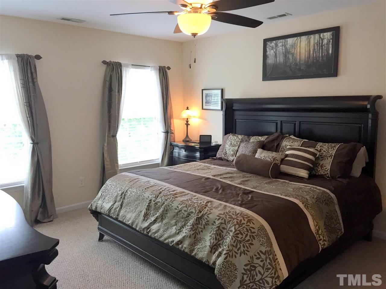 1925 Raj Drive Durham, NC 27703 - Photo 13 of 25 Large master bedroom with natural light, upgraded ceiling fan and huge walk-in closet with a window!