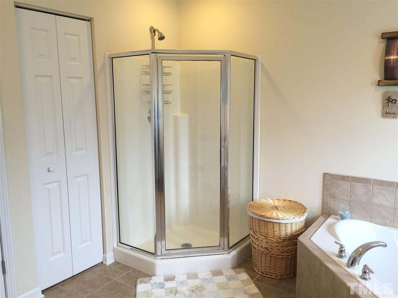1925 Raj Drive Durham, NC 27703 - Photo 16 of 25 HUGE master bath! Separate shower and linen closet. Ceramic tile floors.