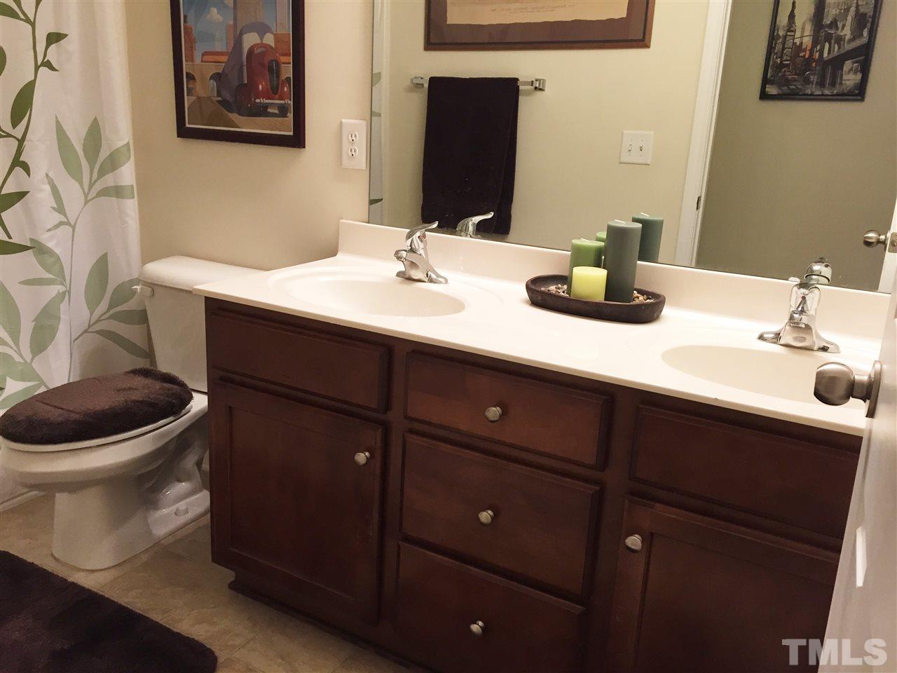 1925 Raj Drive Durham, NC 27703 - Photo 19 of 25 Dual vanities with marble counter tops and plenty of storage!