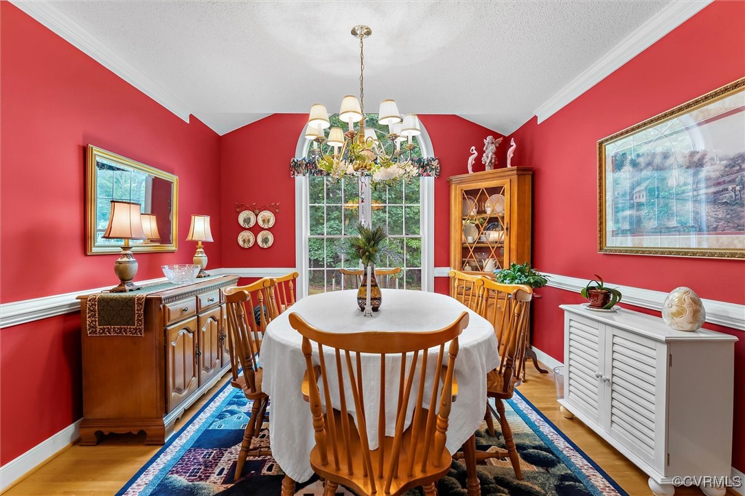 2655 Dorset Ridge Road Powhatan, VA 23139 - Photo 21 of 50 Dining area with vaulted ceiling, a chandelier, li
