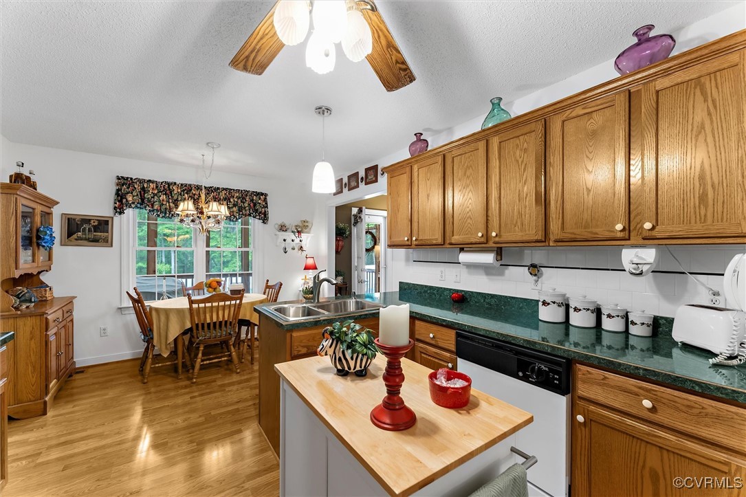 2655 Dorset Ridge Road Powhatan, VA 23139 - Photo 24 of 50 Kitchen with a sink, white dishwasher, butcher blo