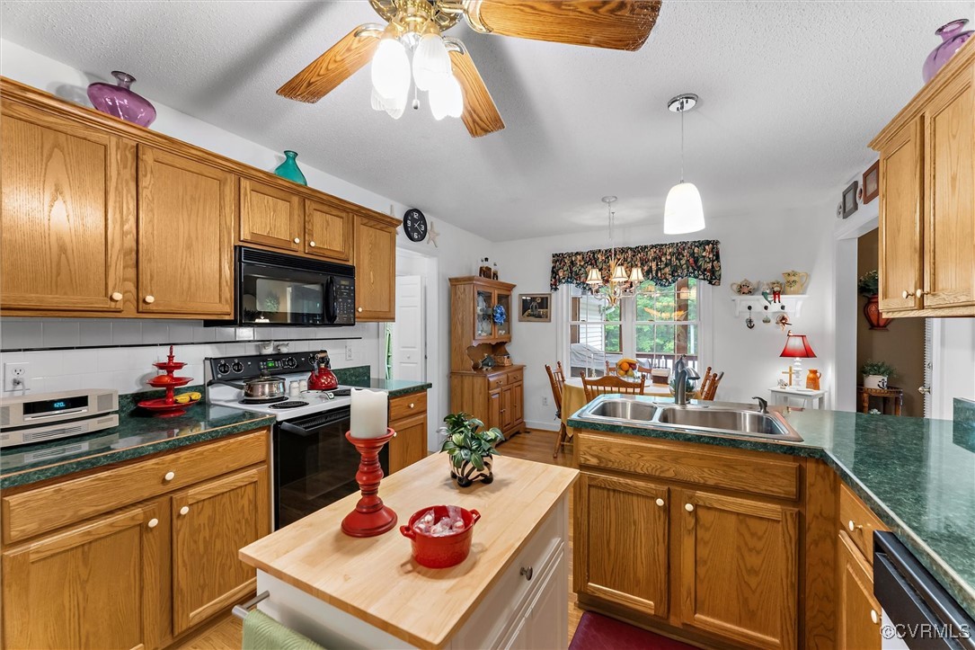2655 Dorset Ridge Road Powhatan, VA 23139 - Photo 25 of 50 Kitchen featuring black appliances, wooden counter