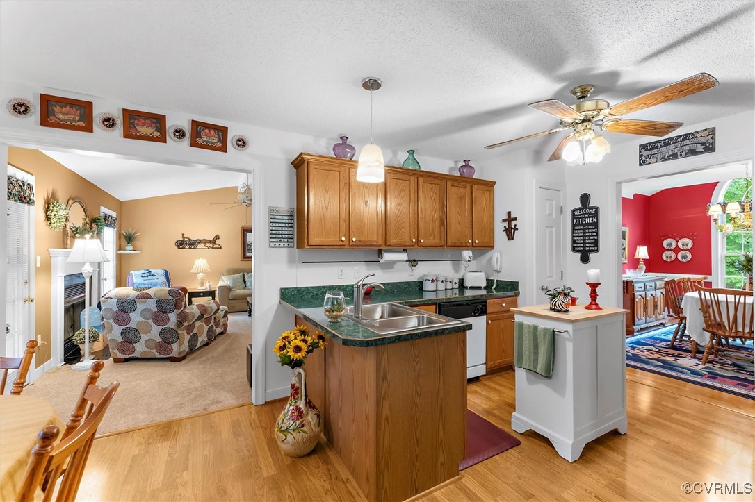 2655 Dorset Ridge Road Powhatan, VA 23139 - Photo 30 of 50 Kitchen with white dishwasher, a sink, light wood-
