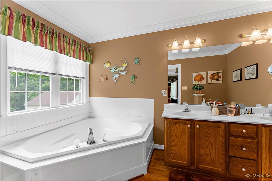 2655 Dorset Ridge Road Powhatan, VA 23139 - Photo 34 of 50 Bathroom featuring crown molding, a bath, wood fin