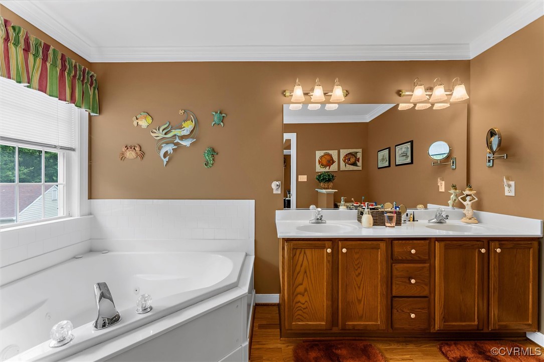2655 Dorset Ridge Road Powhatan, VA 23139 - Photo 35 of 50 Full bathroom with crown molding, wood finished fl