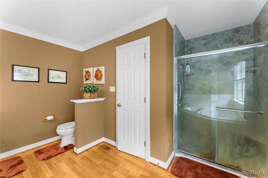 2655 Dorset Ridge Road Powhatan, VA 23139 - Photo 37 of 50 Full bathroom featuring a shower stall, wood finis