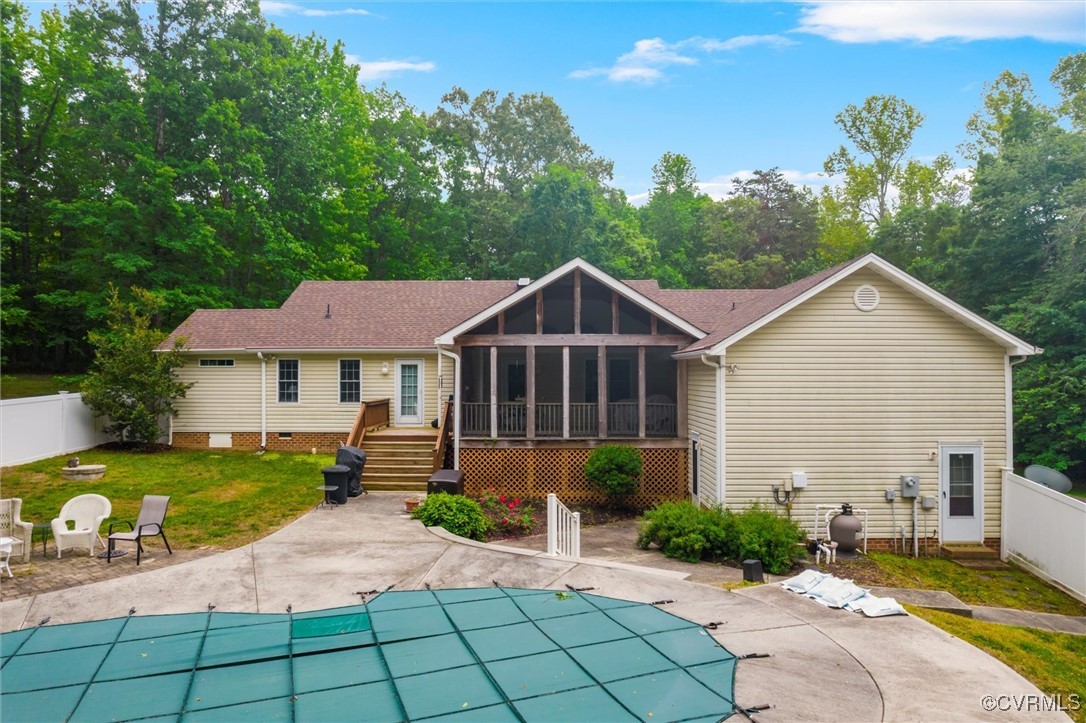 2655 Dorset Ridge Road Powhatan, VA 23139 - Photo 6 of 50 Back of property with a sunroom, a patio, and a co