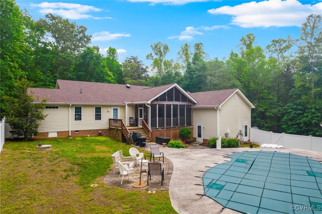 2655 Dorset Ridge Road Powhatan, VA 23139 - Photo 7 of 50 Rear view of house with a sunroom, a patio, crawl