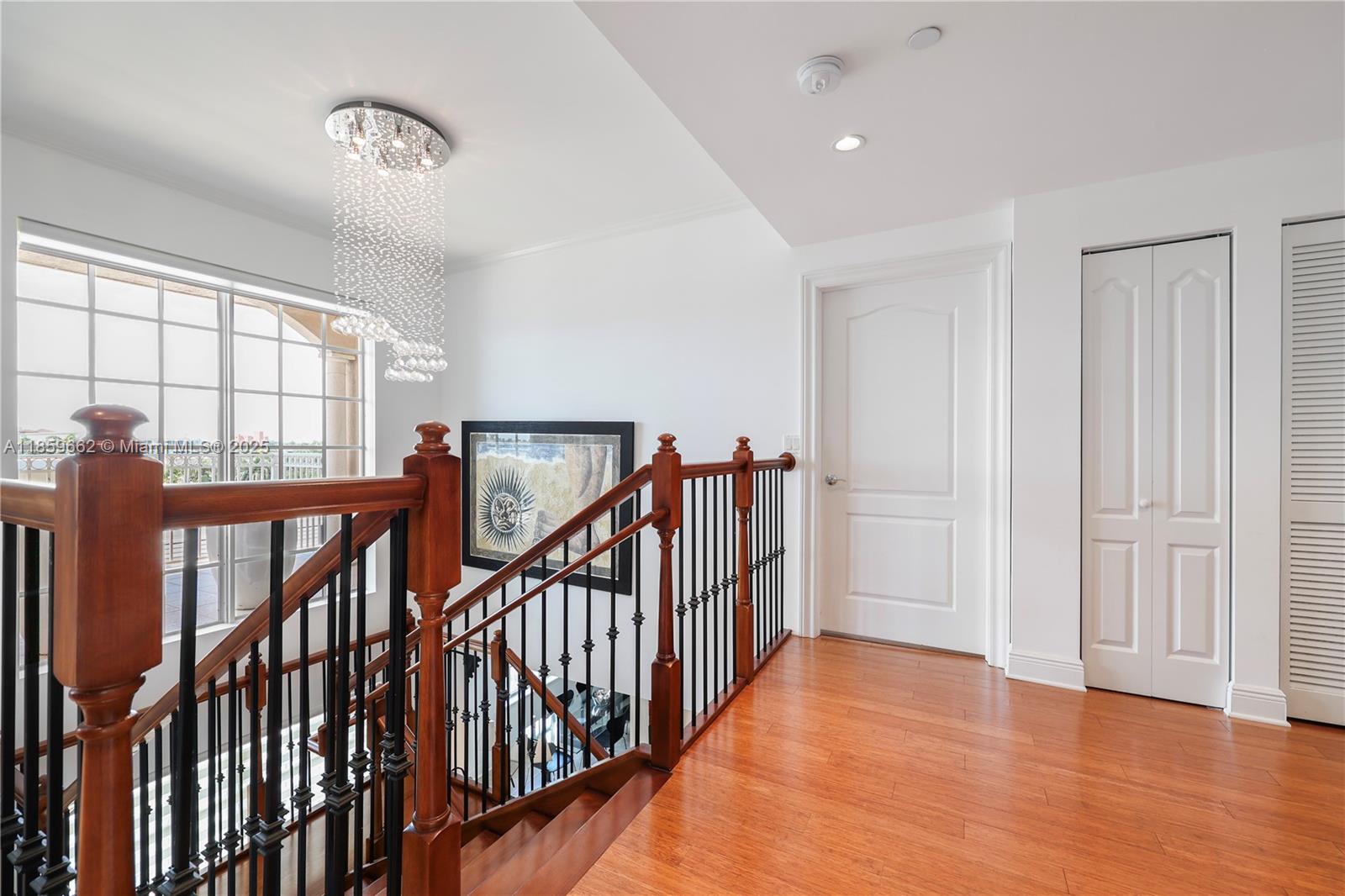 110 Hendricks Isle, Unit 13 Fort Lauderdale, FL 33301 - Photo 19 of 80 a view of an entryway with wooden floor