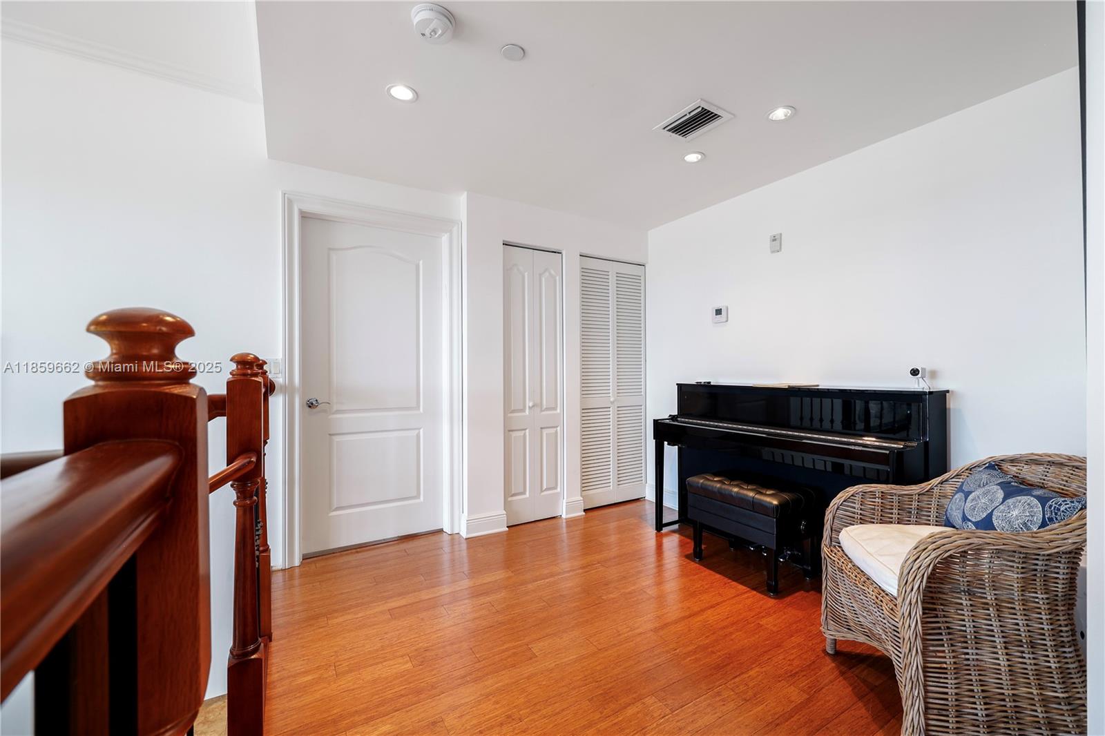 110 Hendricks Isle, Unit 13 Fort Lauderdale, FL 33301 - Photo 20 of 80 a room with furniture and a wooden floor