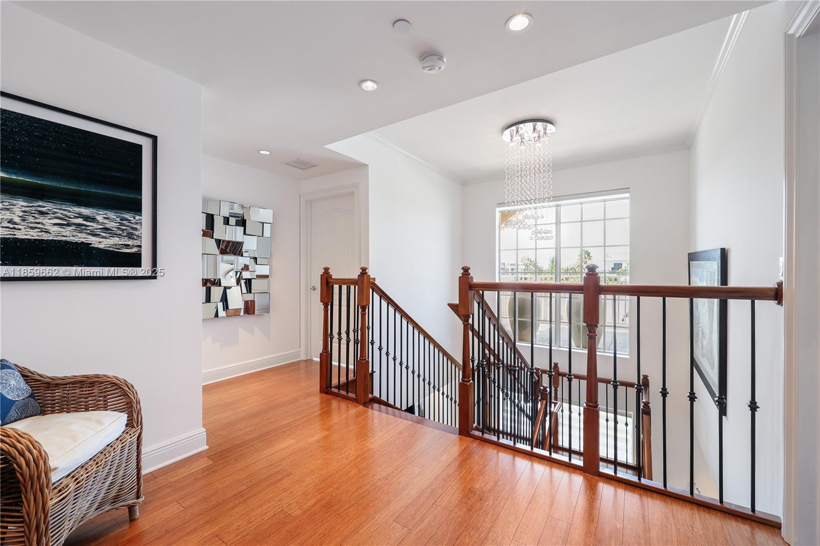 110 Hendricks Isle, Unit 13 Fort Lauderdale, FL 33301 - Photo 21 of 80 a view of a hallway with wooden floor and furniture