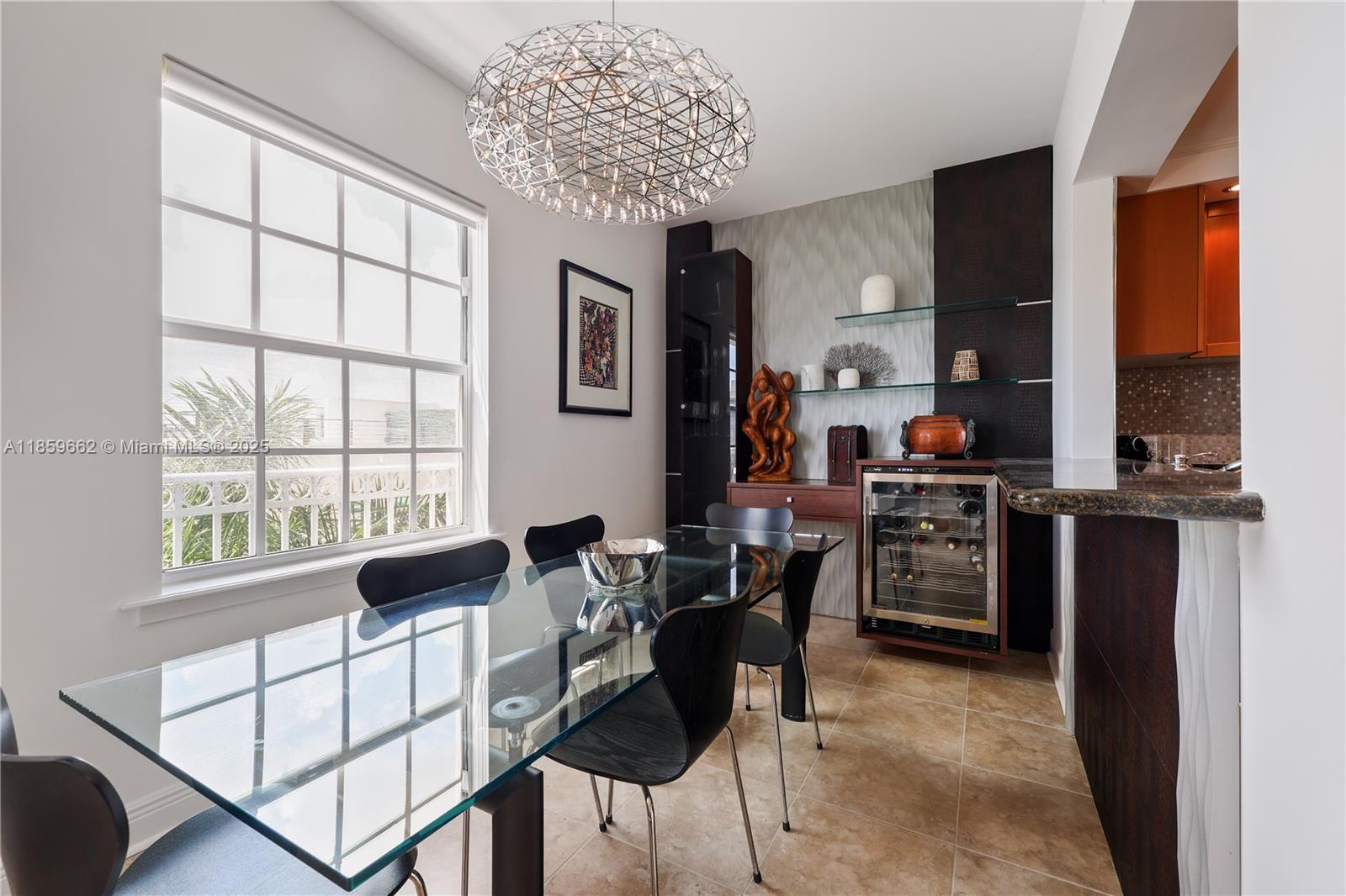 110 Hendricks Isle, Unit 13 Fort Lauderdale, FL 33301 - Photo 26 of 80 a dining room with furniture and window