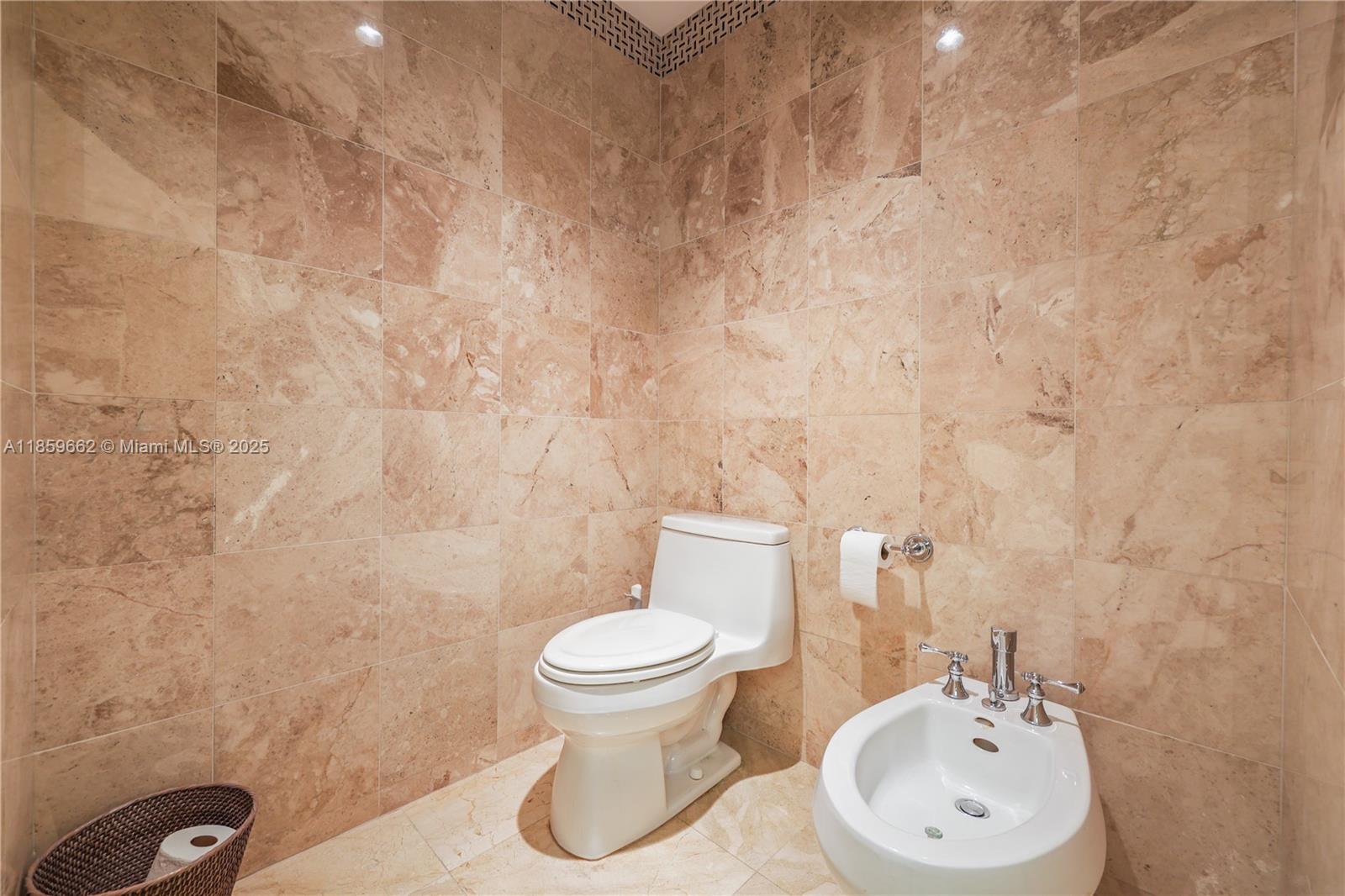 110 Hendricks Isle, Unit 13 Fort Lauderdale, FL 33301 - Photo 47 of 80 a bathroom with a sink and a toilet