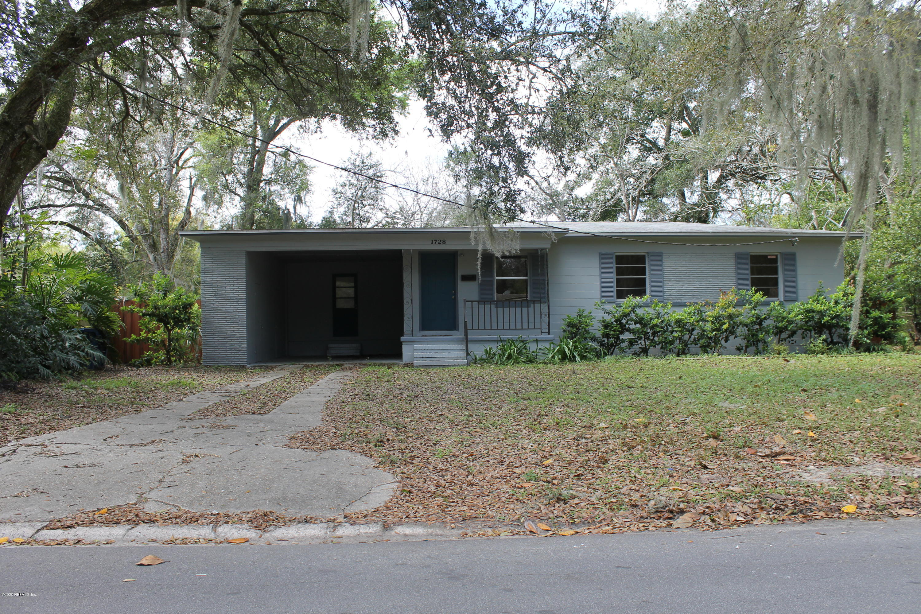 1728 Layton Road Jacksonville, FL 32211 - Photo 1 of 20 a front view of house with yard and trees