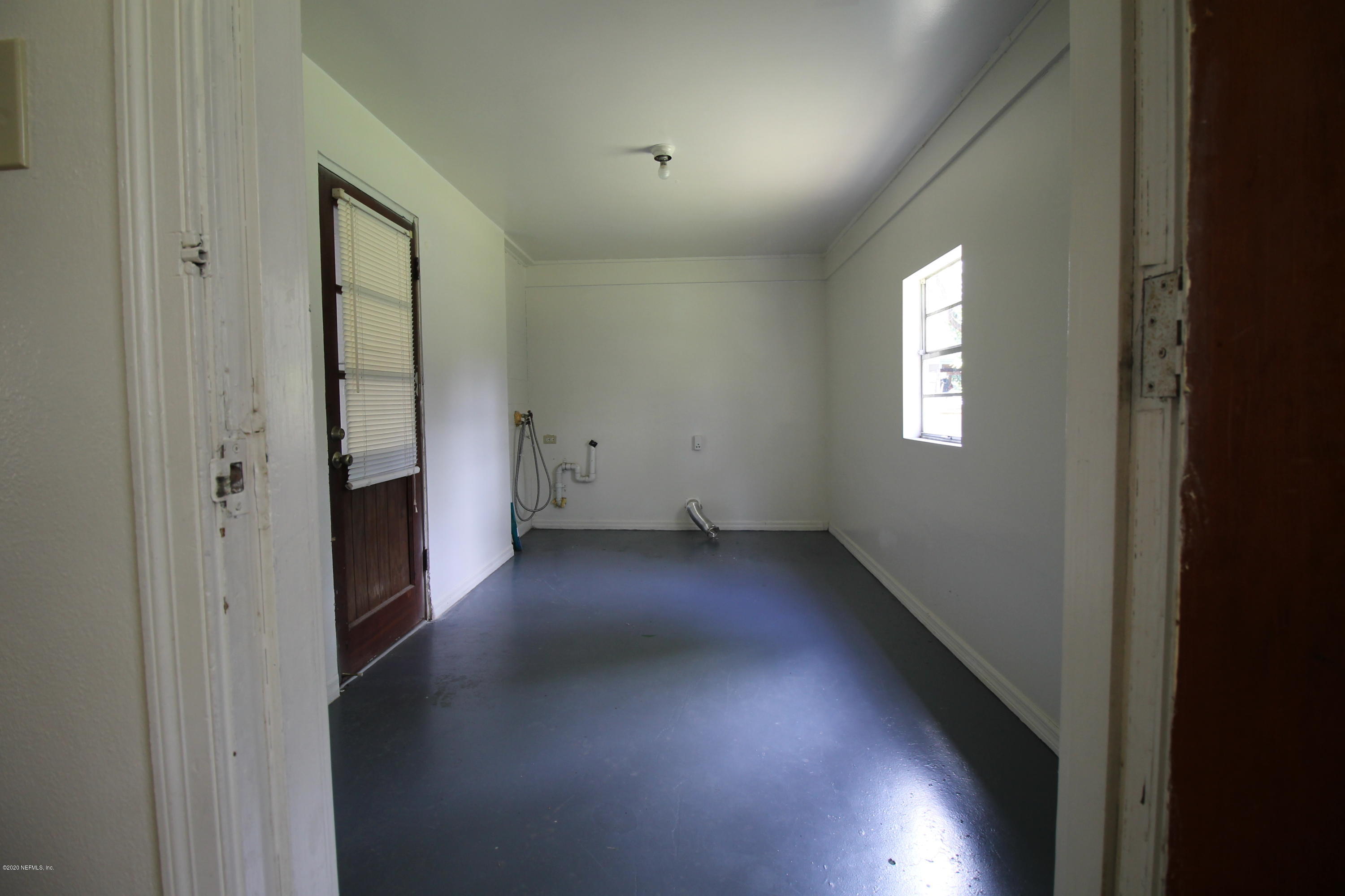 1728 Layton Road Jacksonville, FL 32211 - Photo 17 of 20 a view of a hallway with windows