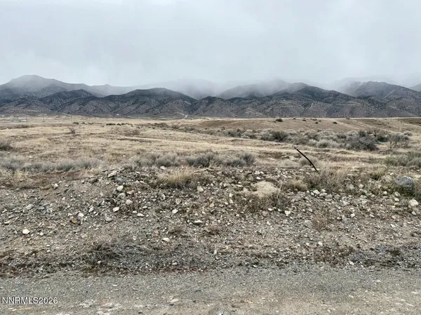 a view of ocean and mountains