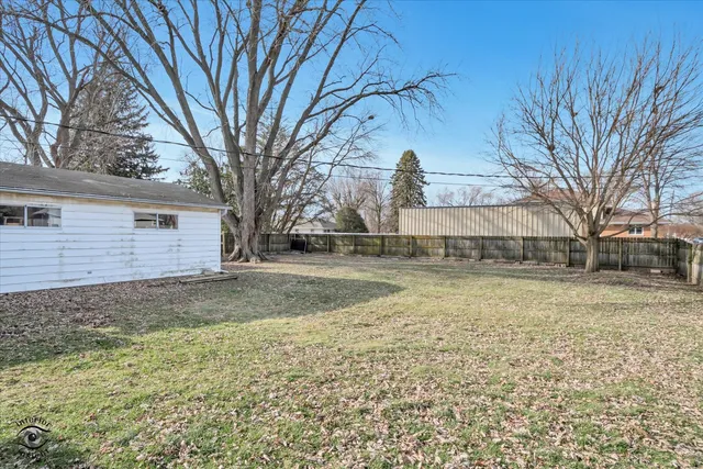 a view of backyard of house