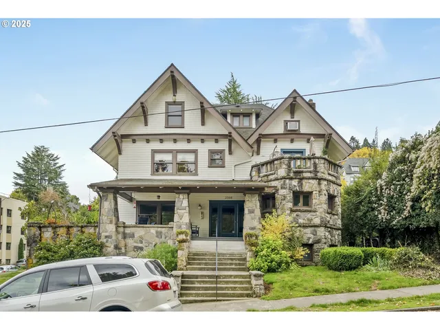 a front view of a house with garage