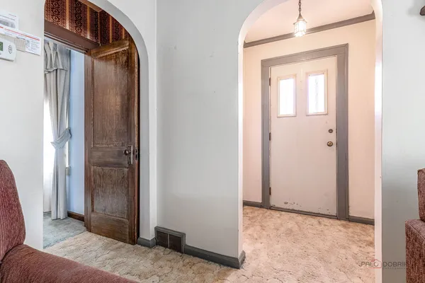 a view of a livingroom with a hallway