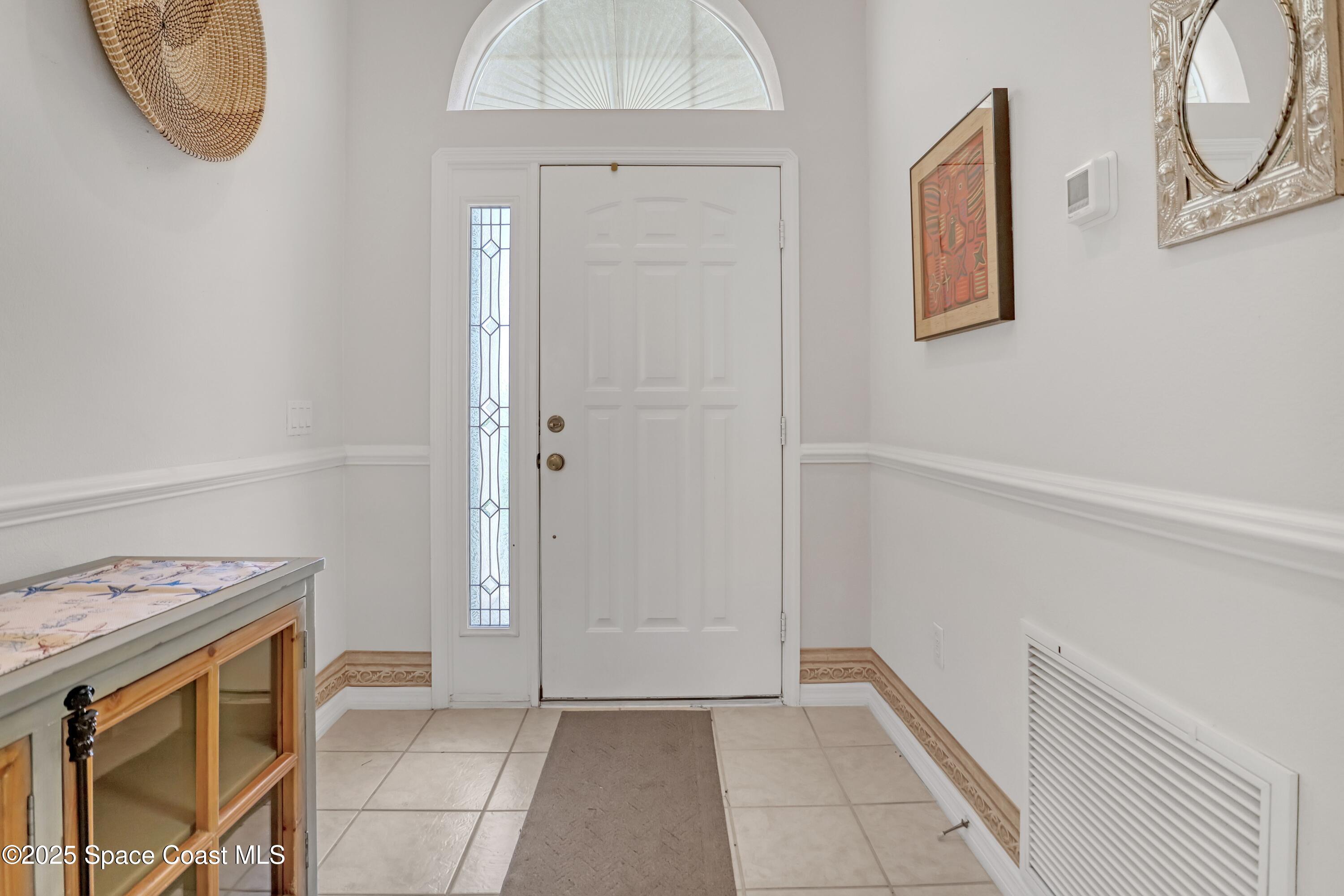 1545 Boca Rio Drive Melbourne, FL 32940 - Photo 3 of 46 V32NELfY