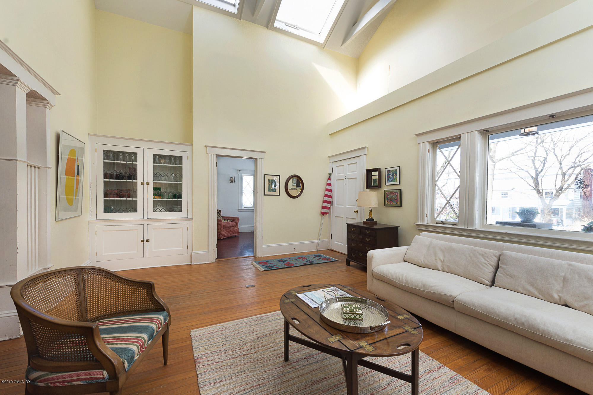 28 Chapel Lane Riverside, CT 06878 - Photo 13 of 38 a living room with furniture and wooden floor
