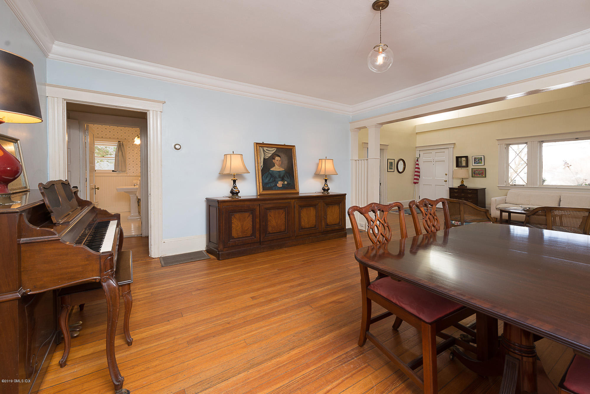 28 Chapel Lane Riverside, CT 06878 - Photo 16 of 38 a view of a dining room with furniture and wooden floor