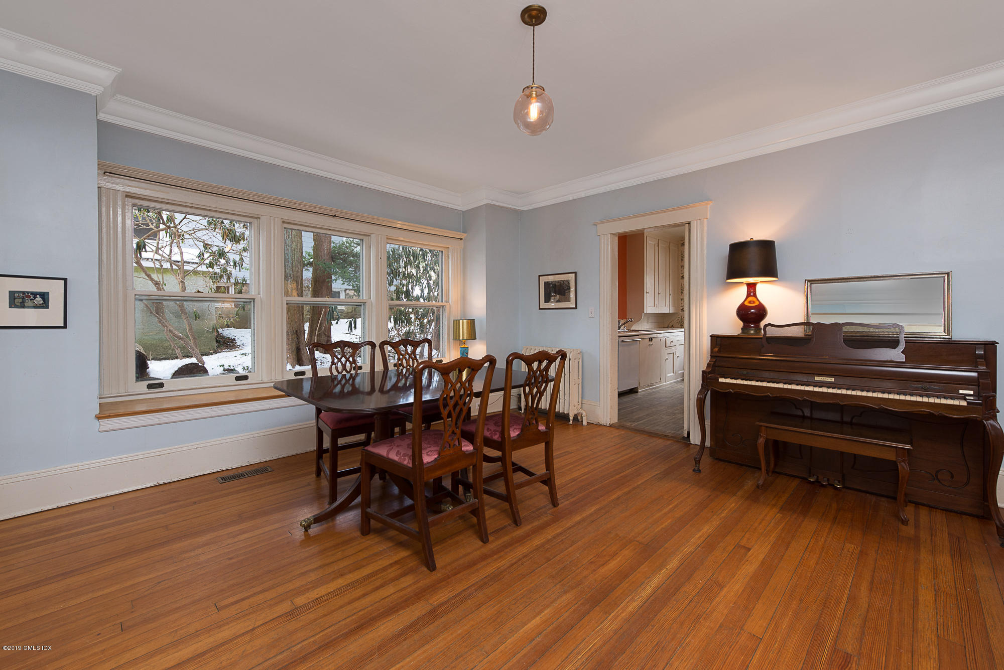 28 Chapel Lane Riverside, CT 06878 - Photo 17 of 38 a dining room with furniture and wooden floor