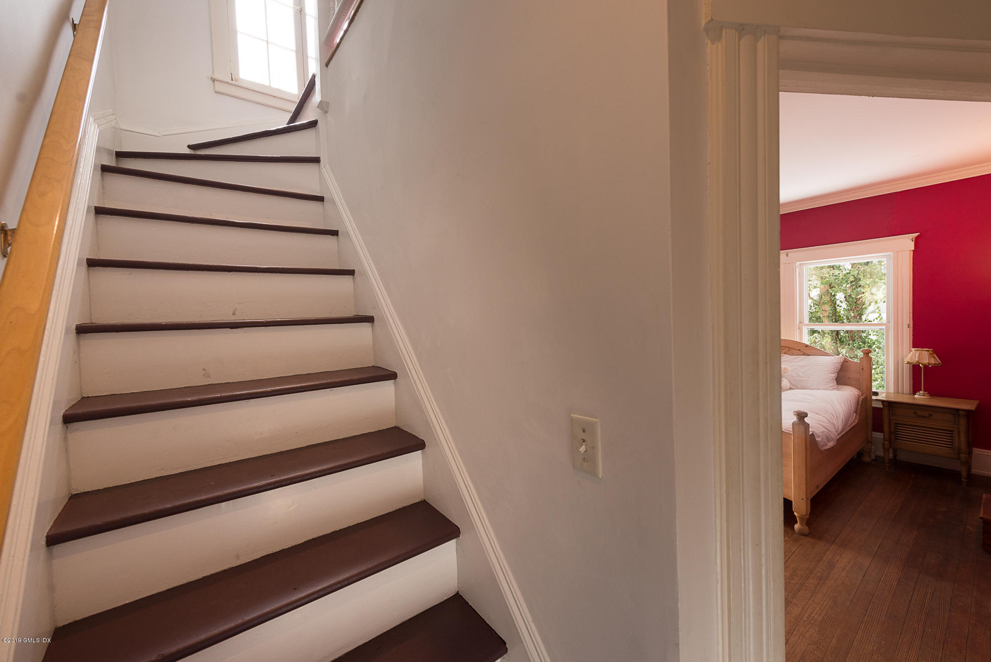 28 Chapel Lane Riverside, CT 06878 - Photo 23 of 38 a view of entryway and hall with wooden floor