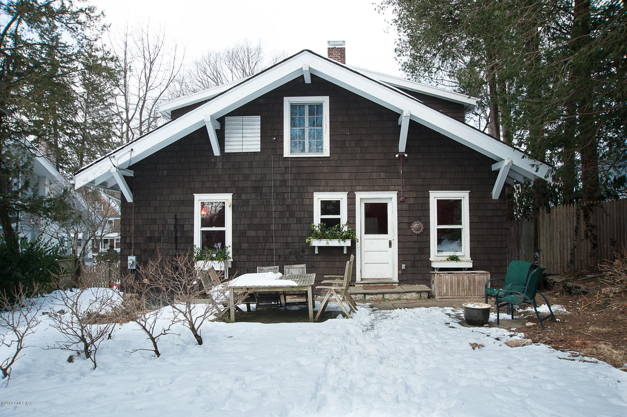 28 Chapel Lane Riverside, CT 06878 - Photo 6 of 38 a view of a house with a patio