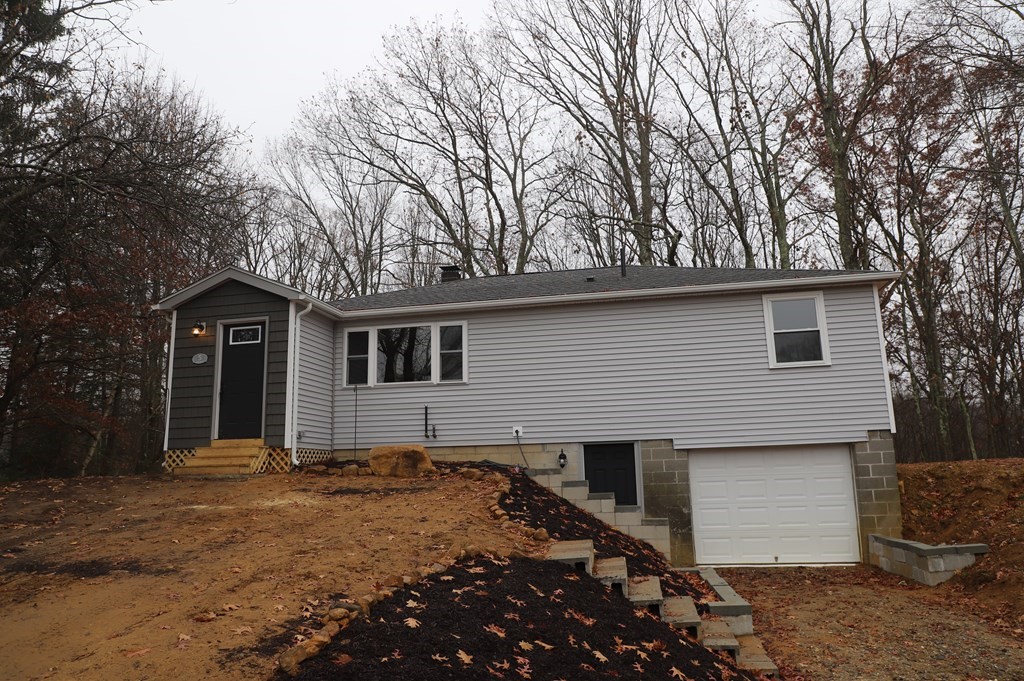 5 Hunt Road North Brookfield, MA 01535 - Photo 1 of 26 a front view of a house with a yard