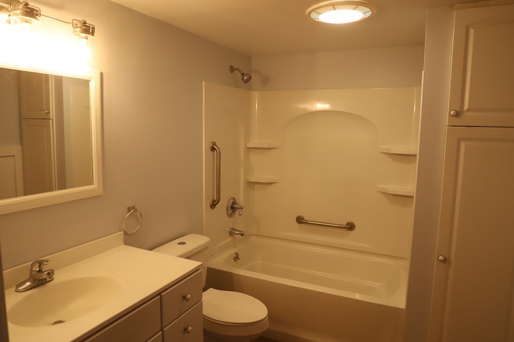 5 Hunt Road North Brookfield, MA 01535 - Photo 11 of 26 a bathroom with a granite countertop sink toilet and shower