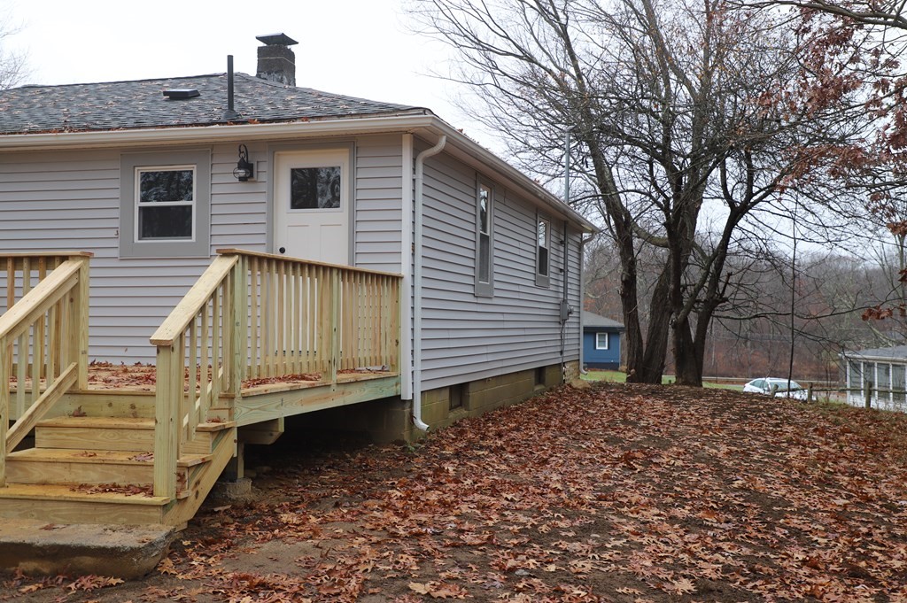 5 Hunt Road North Brookfield, MA 01535 - Photo 3 of 26 a view of a house with a yard