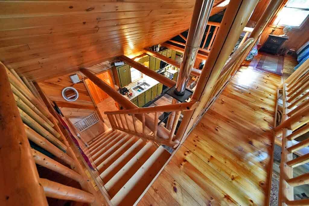 638 Sandy Beach Road Danforth, ME 04424 - Photo 65 of 94 maine-lake-home-stairway