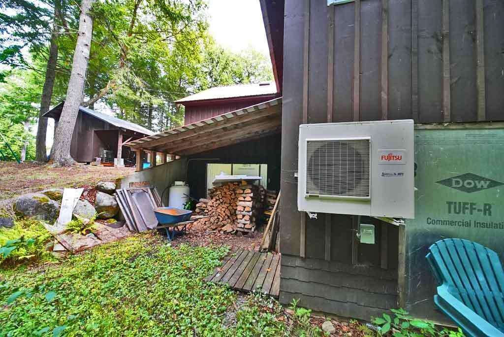 638 Sandy Beach Road Danforth, ME 04424 - Photo 70 of 94 heat-pump-outside-entrance