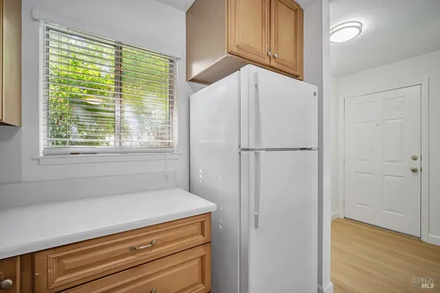 a bathroom with a shower and a window