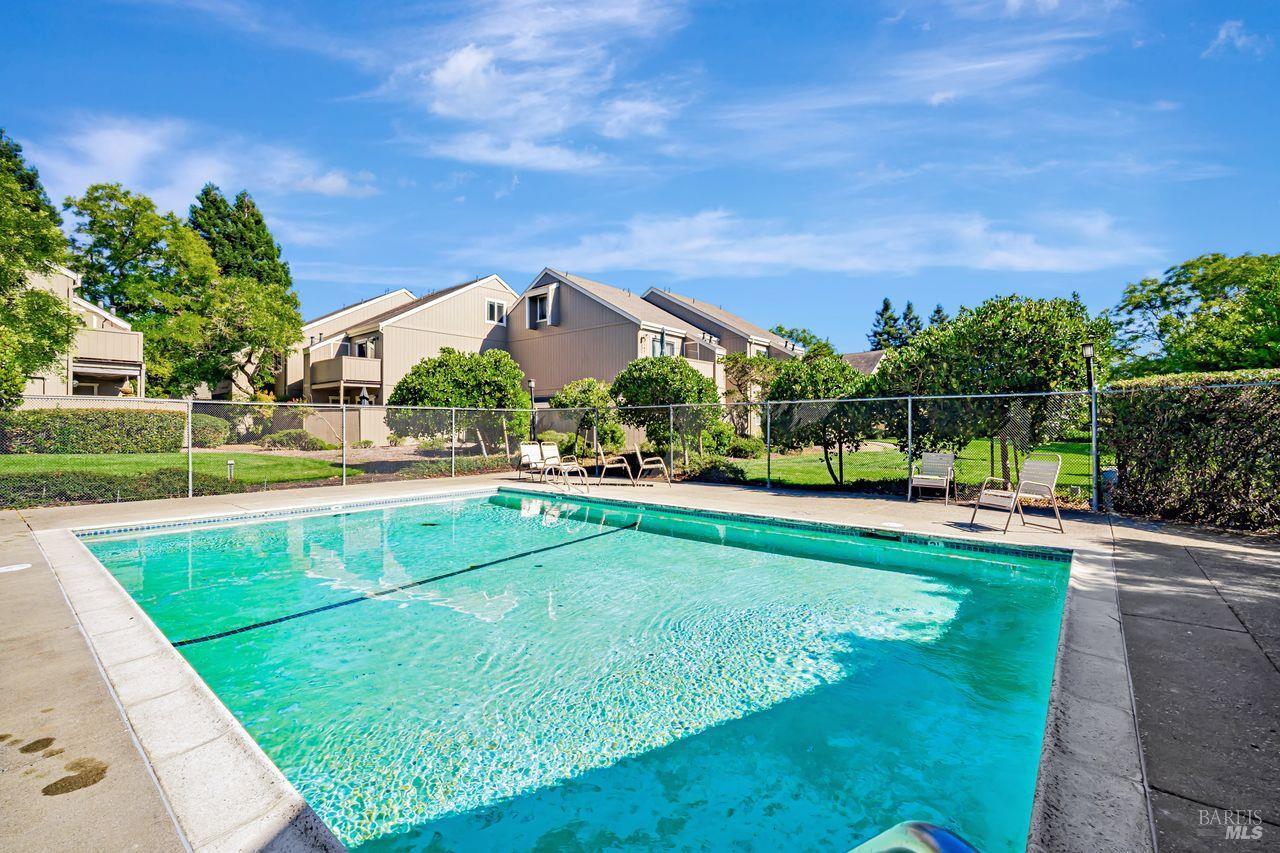 7767 Camino Colegio Rohnert Park, CA 94928 - Photo 29 of 39 Enjoy the nearby pool with with shaded lounge area and views of the green belt.