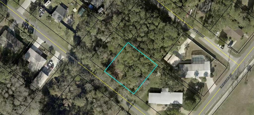 0 North Chapel Street Bunnell, FL 32110 - Photo 4 of 4 an aerial view of a house