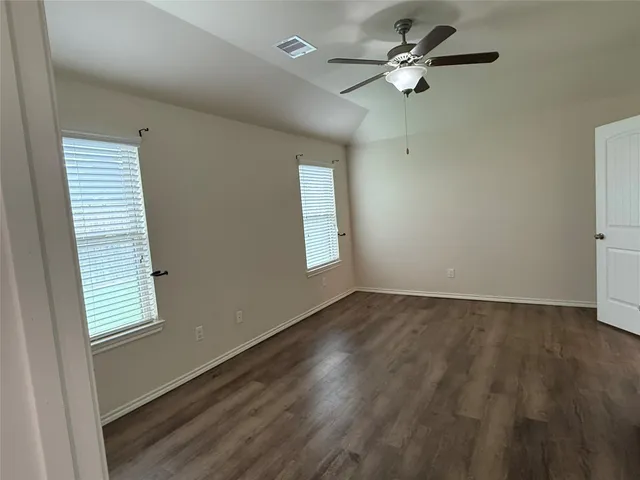 a kitchen with a stove and a sink