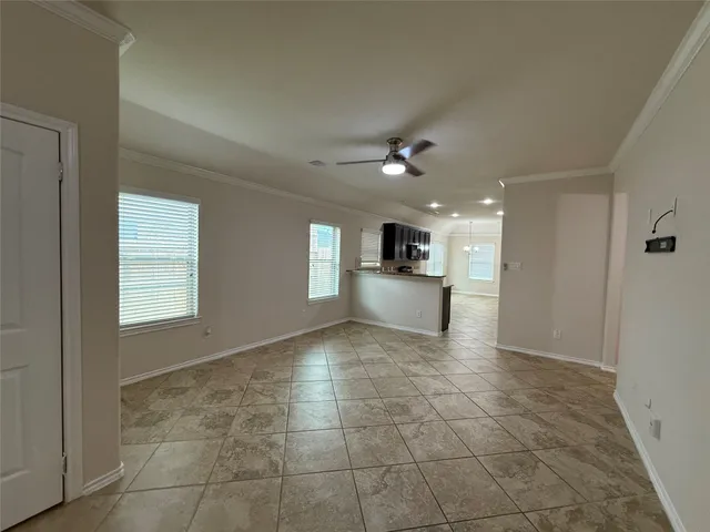 a view of a hallway with a bathroom
