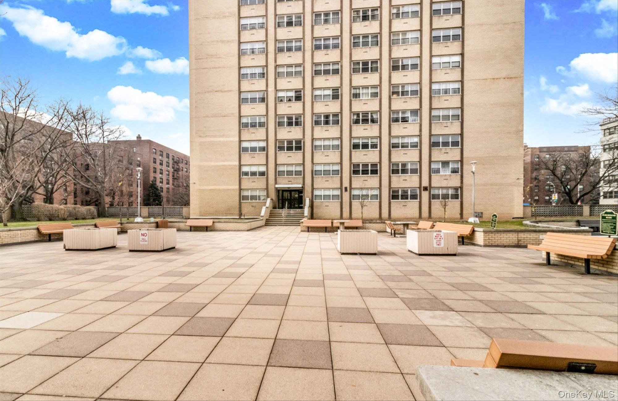102-30 66th Road, Unit A28 Queens, NY 11375 - Photo 19 of 24 a view of a terrace with chairs