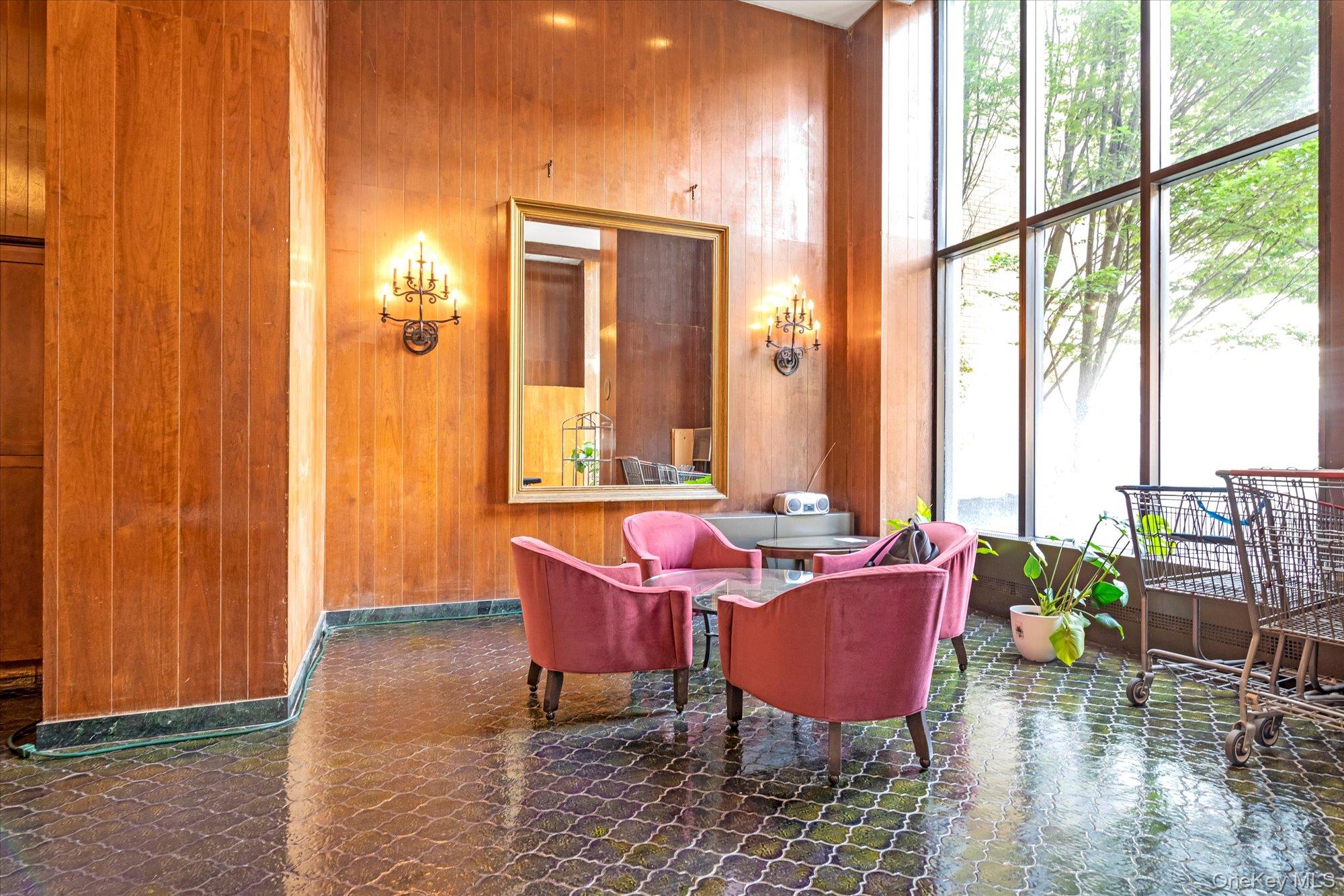 102-30 66th Road, Unit A28 Queens, NY 11375 - Photo 2 of 24 a dining room with furniture and wooden floor