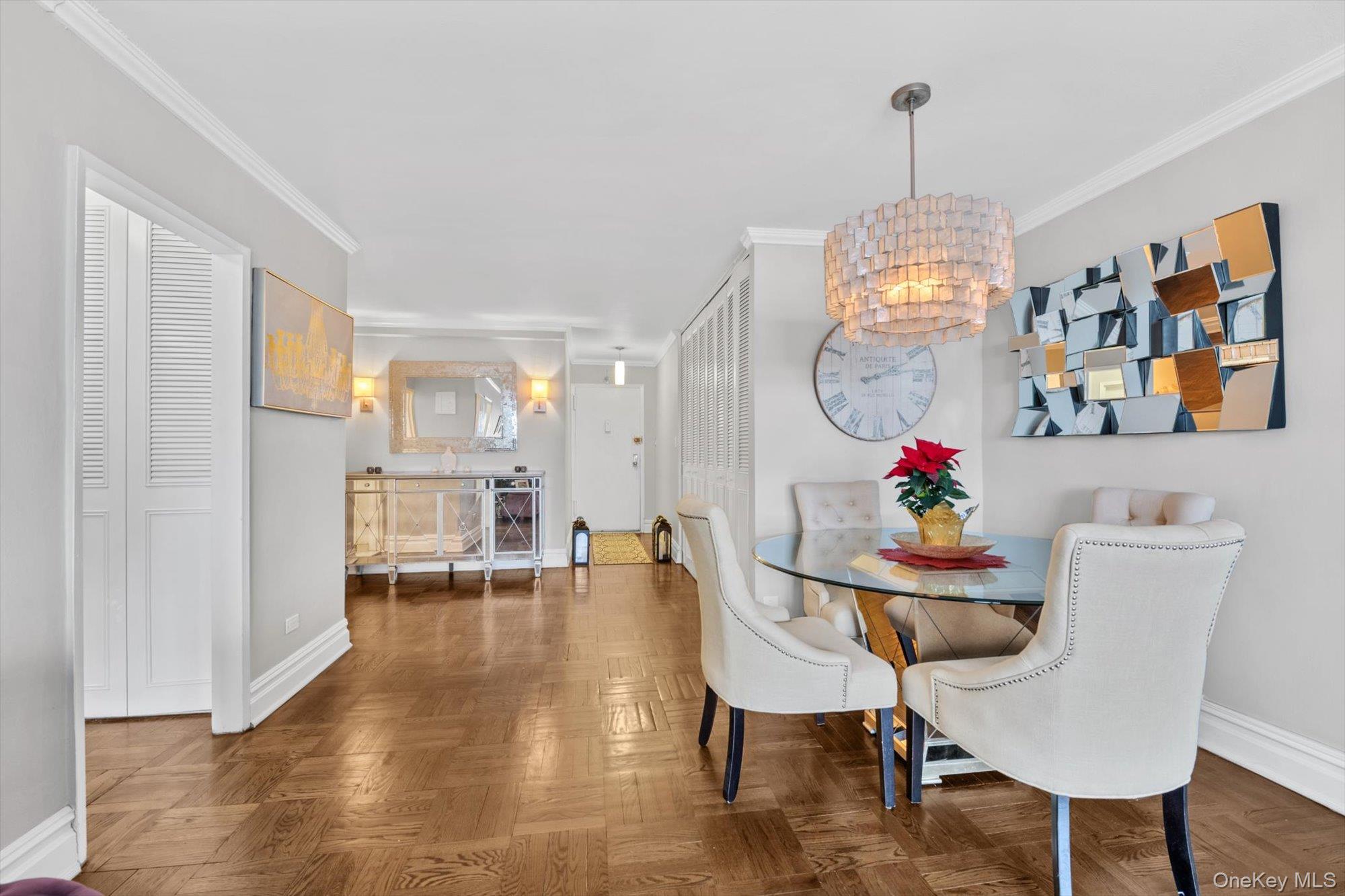 102-30 66th Road, Unit A28 Queens, NY 11375 - Photo 9 of 24 a view of a dining room with furniture and wooden floor