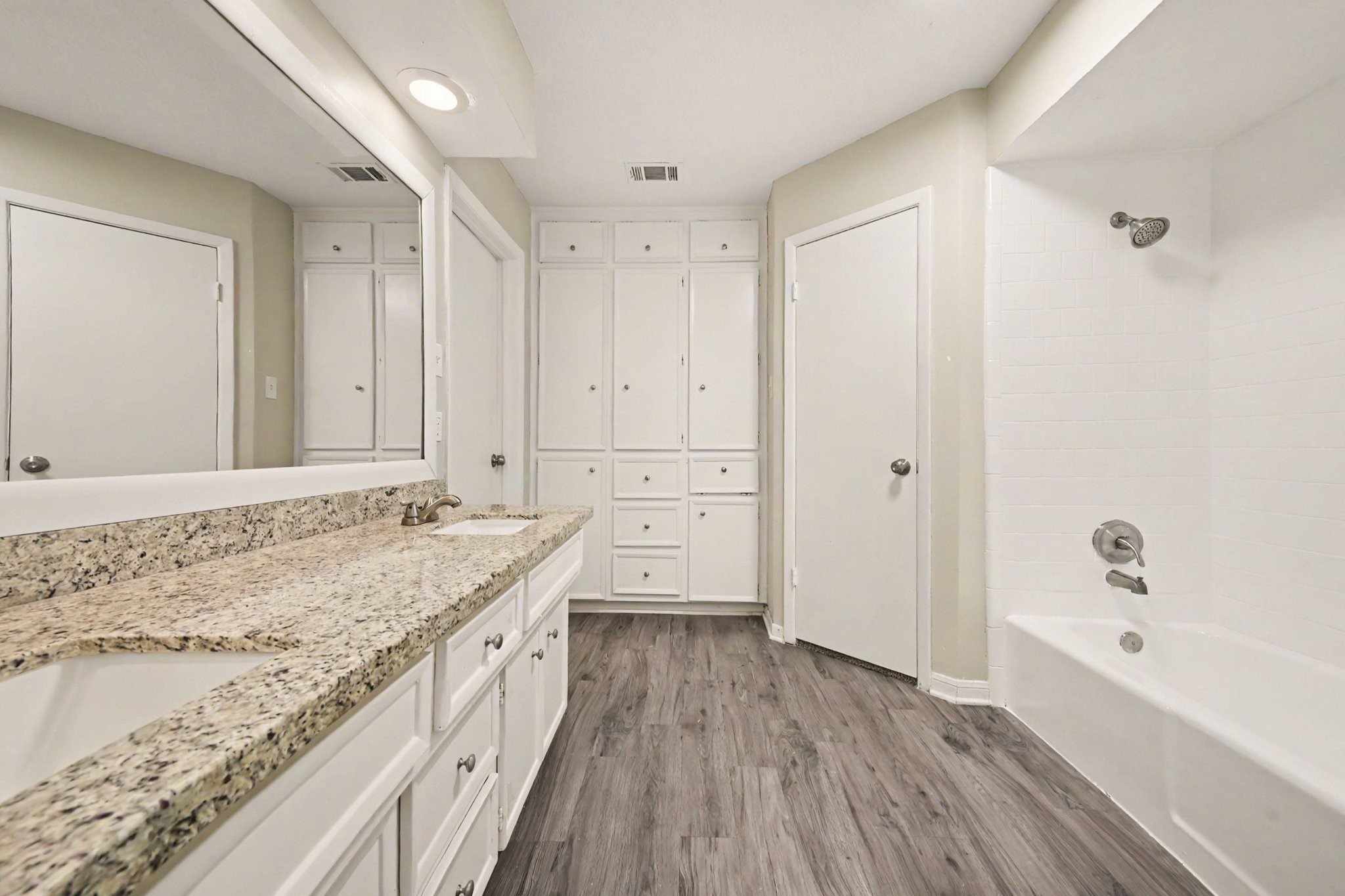 17419 Cassina Drive Spring, TX 77388 - Photo 22 of 35 a bathroom with a granite countertop sink a toilet and shower