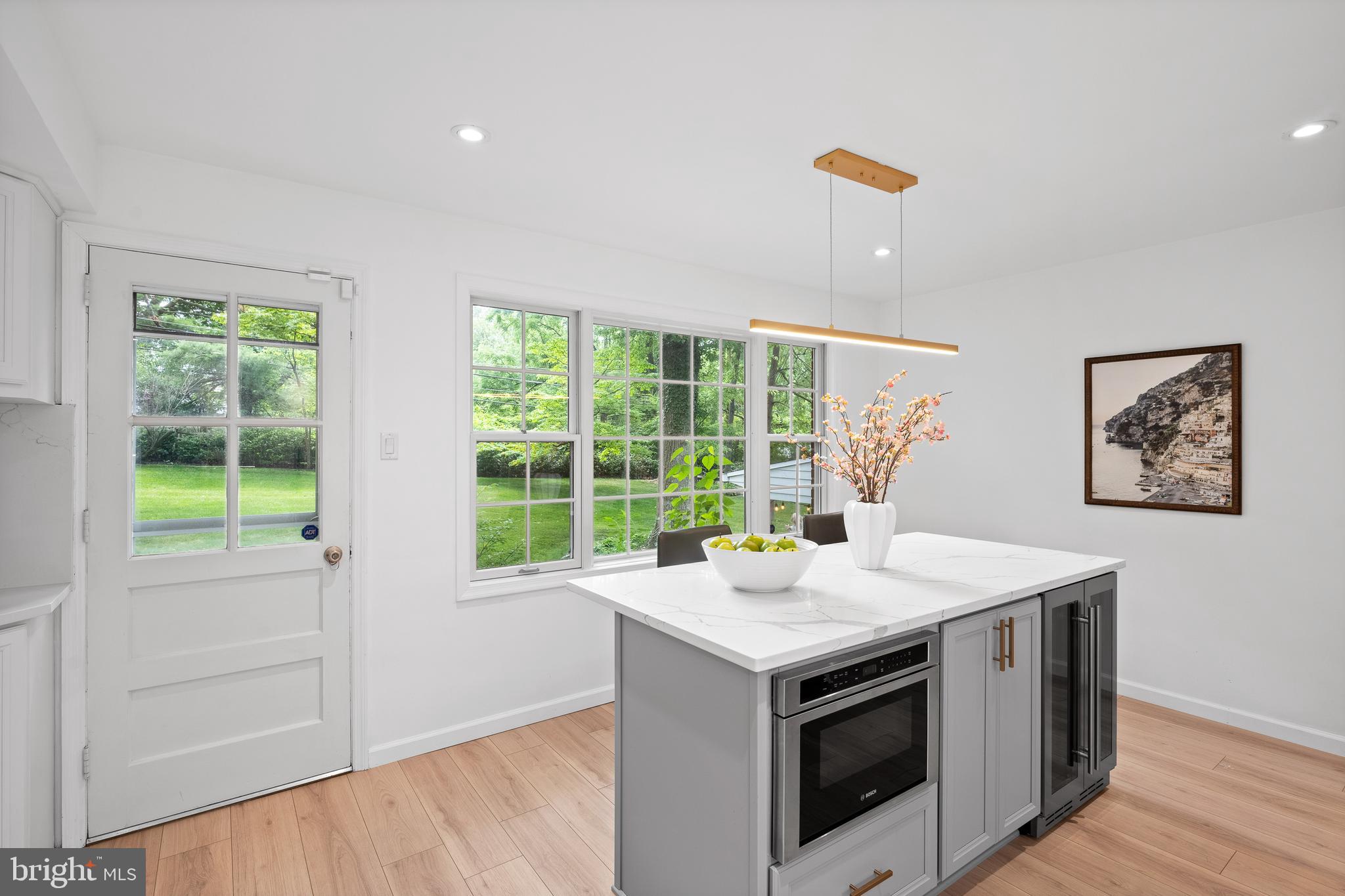 1635 Thomas Road Wayne, PA 19087 - Photo 9 of 52 Door to rear yard and new laminate hardwood floor