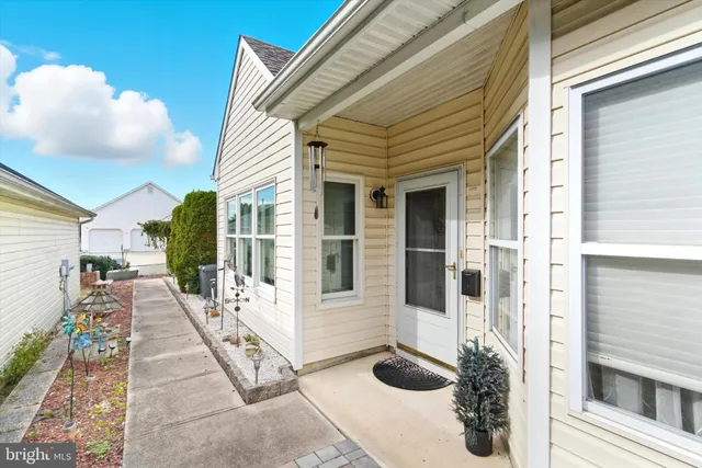 a front view of a house with a porch