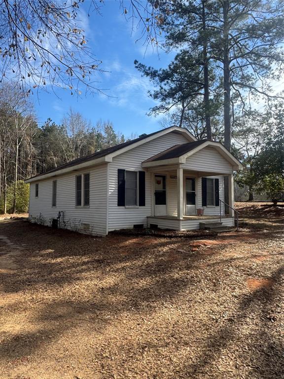 2980 Military Road Ringgold, LA 71068 - Photo 3 of 17 a view of a house with a yard