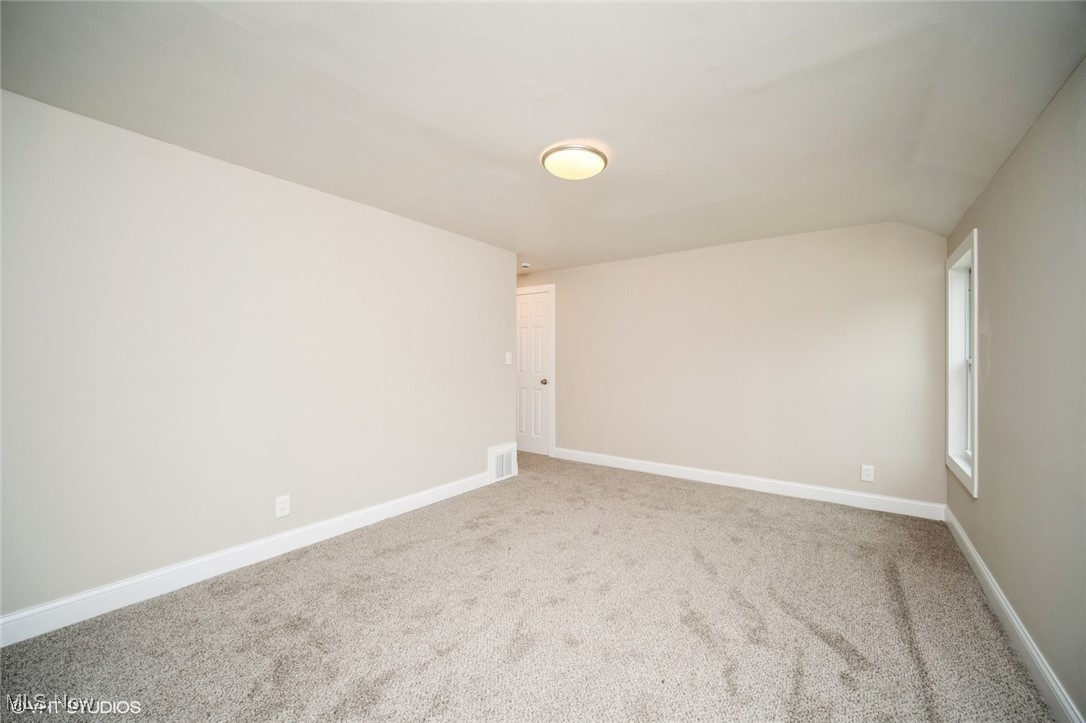 2188 North Taylor Road Cleveland Heights, OH 44112 - Photo 11 of 15 Empty room with carpet and baseboards