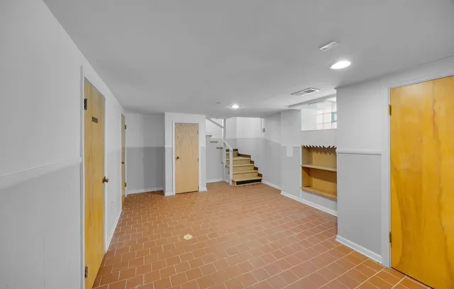 a view of a livingroom with a staircase