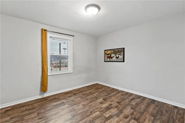 a bathroom with a toilet and a bathtub